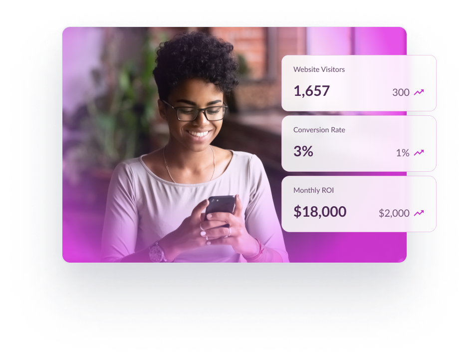 A woman looks amused as she looks at her cell phone